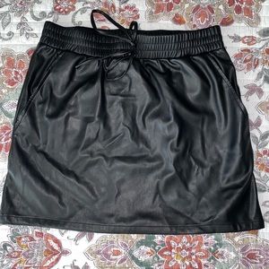 Pleather style skirt. Brand new. Never been worn.